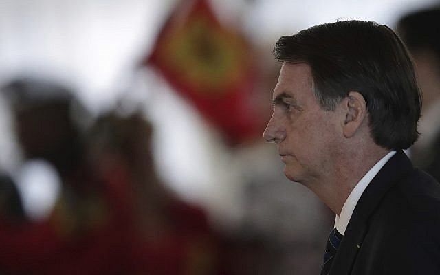 Brazil's President Jair Bolsonaro attends a military awards ceremony in Brasilia, Brazil, Thursday, March 28, 2019. (Eraldo Peres) Brazil's President Jair Bolsonaro attends a military awards ceremony in Brasilia, Brazil, Thursday, March 28, 2019. (Eraldo Peres)