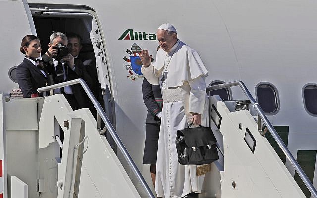 Pope Francis waves as he boards the airplane for Rabat, Morocco at Rome's Fiumicino International airport, Saturday, March 30, 2019 (AP Photo/Alessandra Tarantino) Pope Francis waves as he boards the airplane for Rabat, Morocco at Rome's Fiumicino International airport, Saturday, March 30, 2019 (AP Photo/Alessandra Tarantino)