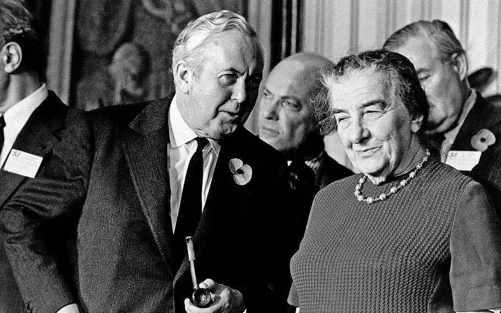 Harold Wilson, leader of Britain's Labor Party and Opposition leader, in conversation with Mrs. Golda Meir of Israel before the start of the Socialist International meeting at London's Churchill Hotel on November 11, 1973. (AP Photo)