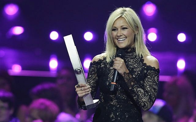 Helene Fischer receives the award for the most successful 'Crossover' artist during the 2016 Echo Music Awards in Berlin, April 7, 2016. (AP Photo/Markus Schreiber, Pool) Helene Fischer receives the award for the most successful 'Crossover' artist during the 2016 Echo Music Awards in Berlin, April 7, 2016. (AP Photo/Markus Schreiber, Pool)