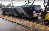 The scene in Jerusalem where a man was killed when he became trapped beneath a bus. (YouTube screenshot)