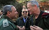 Then-defense minister Ehud Barak (center), then-IDF chief of staff Benny Gantz (right),  and Gantz's later successor in the role, Gadi Eisenkot, pictured near the northern border on February 15, 2011. (Defense Ministry/ Flash90/ File)
