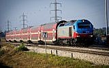 Illustrative: A train pulling through the Hefer Valley, Israel. June 24, 2013. (Moshe Shai/FLASH90)