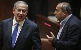 Prime Minister Benjamin Netanyahu (L) speaks with Joist (Arab) List MK Ahmad Tibi during a Knesset plenum session on June 29, 2015. (Hadas Parush/Flash90)