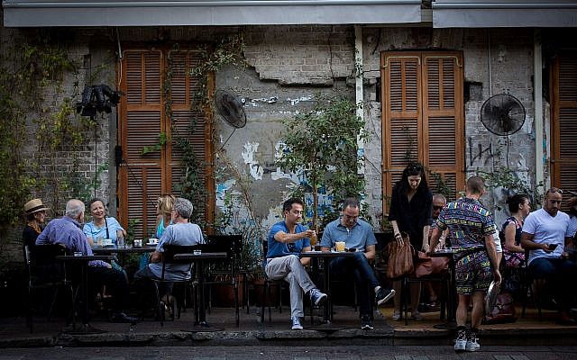Diners sit at Rothschild 12 restaurant on Rothschild Boulevard in Tel Aviv, on June 22, 2017 (Miriam Alster/FLASH90) Diners sit at Rothschild 12 restaurant on Rothschild Boulevard in Tel Aviv, on June 22, 2017 (Miriam Alster/FLASH90)