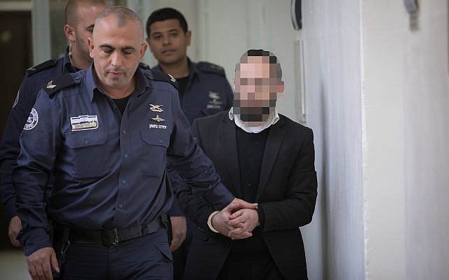 A suspect in the murder of Yehuda and Tamar Kaduri is brought before the Jerusalem Magistrate's Court, on February 26, 2019. (Noam Revkin Fenton/Flash90) A suspect in the murder of Yehuda and Tamar Kaduri is brought before the Jerusalem Magistrate's Court, on February 26, 2019. (Noam Revkin Fenton/Flash90)