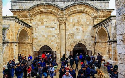 Palestinians take part in Friday prayers outside the Golden Gate in Jerusalem's Old City, on March 1, 2019. (Sliman Khader/Flash90)
