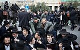 An ultra-Orthodox demonstration against the arrest of an IDF draft-dodger in Jerusalem on March 7, 2019. (Noam Revkin Fenton/Flash90)