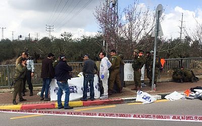Israeli security forces at the scene where a Palestinian carried out a deadly attack near Gitai-Avishar junction, March 17, 2019. (Flash90)