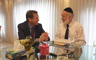 Jewish Agency head Isaac Herzog meets with Argentinean Chief Rabbi Gavriel Davidovich at his home in Buenos Aires. (Courtesy of Jewish Agency for Israel via JTA)