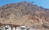 An IDF helicopter assists in recovering the body of US tourist who apparently slipped and fell to his death in a ravine in the Eilat mountains area, March 10, 2019. (Israel Police)