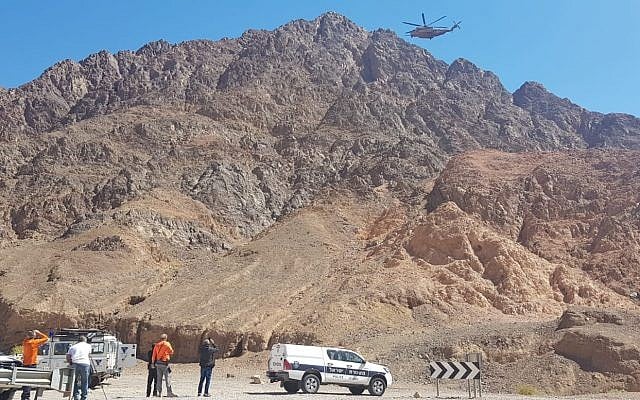 An IDF helicopter assists in recovering the body of US tourist who apparently slipped and fell to his death in a ravine in the Eilat mountains area, March 10, 2019. (Israel Police) An IDF helicopter assists in recovering the body of US tourist who apparently slipped and fell to his death in a ravine in the Eilat mountains area, March 10, 2019. (Israel Police)
