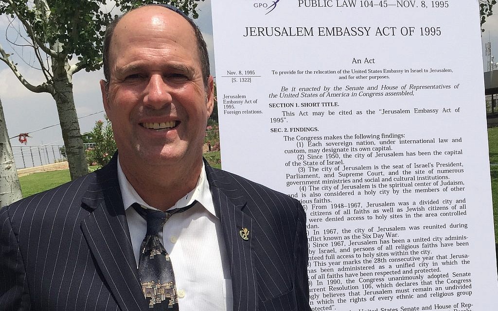 Farley Weiss, president of the National Council of Young Israel, poses next to the text of the Jerusalem Embassy Act of 1995. Weiss says political activism is part of Young Israel’s mission. (Courtesy of Weiss/via JTA) Farley Weiss, president of the National Council of Young Israel, poses next to the text of the Jerusalem Embassy Act of 1995. Weiss says political activism is part of Young Israel’s mission. (Courtesy of Weiss/via JTA)