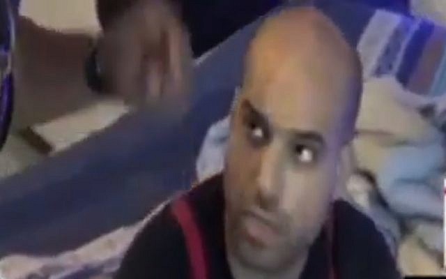 Screen capture from video of Israeli Nati Hadad during his arrest in Thailand, July 2017. (Ynetnews) Screen capture from video of Israeli Nati Hadad during his arrest in Thailand, July 2017. (Ynetnews)