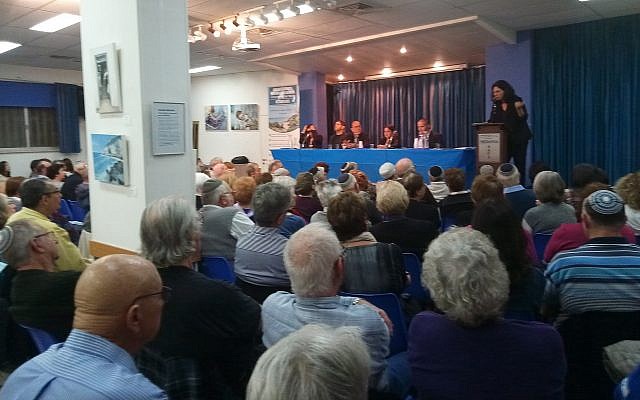 Times of Israel's Miriam Herschlag (standing at right) moderates the first of ToI's election debates, in Netanya on March 13, 2019. (ToI staff) Times of Israel's Miriam Herschlag (standing at right) moderates the first of ToI's election debates, in Netanya on March 13, 2019. (ToI staff)