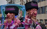 A parade float at the Aalst Carnaval in Belgium featuring caricatures of Orthodox Jews atop money bags, March 3, 2019. (Courtesy of FJO, via JTA)