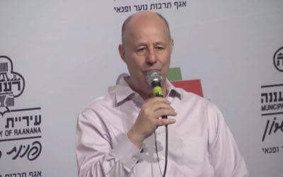 Tzachi Hanegbi speaks at a cultural event in Ra'anana on March 16, 2018. (Screen capture/Ynet)