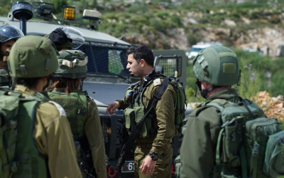 IDF soldiers near the scene of a shooting attack near the northern West Bank Ariel Junction on March 17, 2019. (Israel Defense Forces)