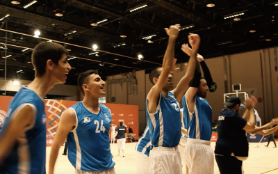 Israeli basketball players celebrate a victory over Canada at the Special Olympics in Abu Dhabi, United Arab Emirates, March 16, 2019. (David P. Alexander/Times of Israel)