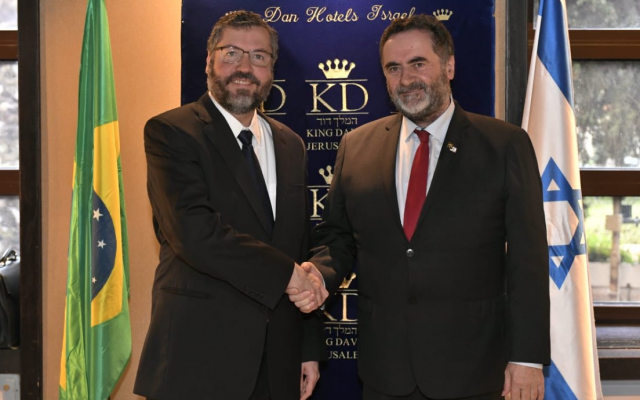 Acting Foreign Minister Israel Katz (R) shakes hands with Brazil Foreign Affairs Minister Ernesto Araujo, in the King David Hotel on March 31, 2019. (Twitter) Acting Foreign Minister Israel Katz (R) shakes hands with Brazil Foreign Affairs Minister Ernesto Araujo, in the King David Hotel on March 31, 2019. (Twitter)