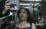 A subject taking an electro-olfacto-gram test in the lab of Prof. Noam Sobel at the Weizmann Institute of Science in Rechovot. (YouTube screenshot)