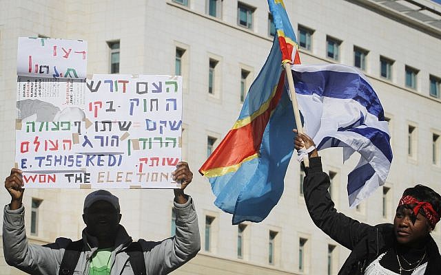 Congolese activists demonstrate outside Prime Minister Netanyahu's office in Jerusalem, calling for the Israeli government to disregard newly elected Congolese president Joseph Kabila and to support leader of opposition Etienne Tshisekedi as new president, on December 18, 2011. (Miriam Alster/FLASH90) Congolese activists demonstrate outside Prime Minister Netanyahu's office in Jerusalem, calling for the Israeli government to disregard newly elected Congolese president Joseph Kabila and to support leader of opposition Etienne Tshisekedi as new president, on December 18, 2011. (Miriam Alster/FLASH90)