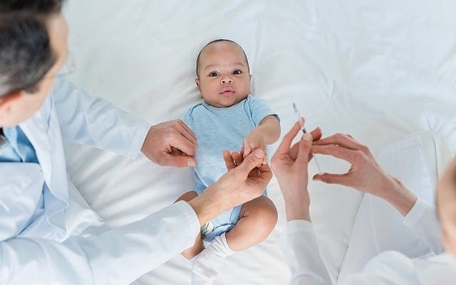Illustrative: Pediatricians preparing to vaccinate  a baby. (Getty Images)