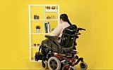 Clip on mirror that allows a wheelchair-bound person see what is on shelf above their eye level produced in a joint project between IKEA and Israeli accessibility groups. (YouTube screenshot)