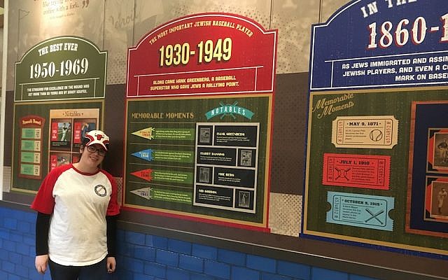 An exhibit at the Jewish baseball museum at Milt's Extra Innings in Chicago. At left is deli worker Zahava Auerbach. (Ellen Braunstein via JTA) An exhibit at the Jewish baseball museum at Milt's Extra Innings in Chicago. At left is deli worker Zahava Auerbach. (Ellen Braunstein via JTA)
