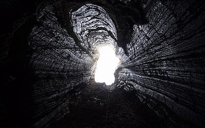 One of the vertical openings that allows cavers to rappel down into the Malcham cave system from the top of Mount Sodom near the southern Dead Sea, pictured on March 22, 2019. (courtesy Anton Chikishev/Hebrew Unviersity)