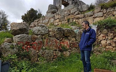 Uri Berger, an archaeologist in the Upper Eastern Galilee, filed a complaint with the police for the vandalism at the Mt. Meron Nature Reserve on March 4, 2019. (Nadia Azar/Israel Antiquities Authority)