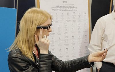 An illustration of how the OrCam machine will be used at 12 polling stations around Israel in a pilot project to create greater accessibility for disabled people in the April 9, 2019 general elections (Courtesy)