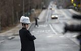 This picture taken on April 5, 2019 shows a boy walking on the street in a Jewish neighborhoods of Nyack, Rockland County, New York. (Johannes Eisele/AFP)