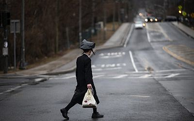 Illustrative: A youth crosses a street in Monsey, Rockland County, New York, on April 5, 2019. (Johannes Eisele/AFP/File)