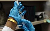 This picture from April 5, 2019, shows a nurse preparing the measles, mumps and rubella vaccine at the Rockland County Health Department in Haverstraw, Rockland County, New York. (Johannes Eisele/AFP)