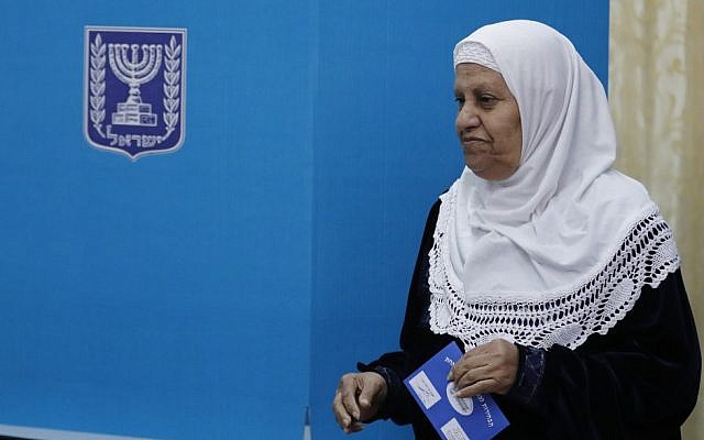 An Arab Israeli woman votes in Israel's parliamentary elections on April 9, 2019, at a school turned polling station in the northern town of Taybe. (Ahmad GHARABLI / AFP)