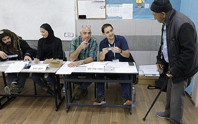 An Israeli man arrives at a polling station to vote in Israel's parliamentary elections on April 9, 2019 in the northern Arab Israeli town of Taibe. (Ahmad Gharabli/AFP)
