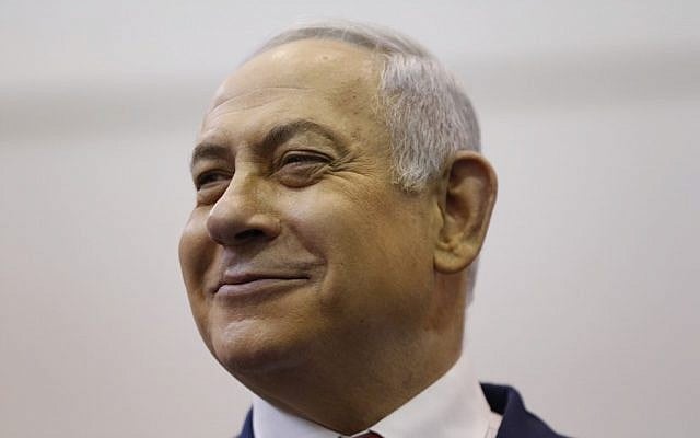 Prime Minister Benjamin Netanyahu smiles as he votes during Israel's parliamentary elections in Jerusalem, on April 9, 2019. (Ariel Schalit/Pool/AFP) Prime Minister Benjamin Netanyahu smiles as he votes during Israel's parliamentary elections in Jerusalem, on April 9, 2019. (Ariel Schalit/Pool/AFP)