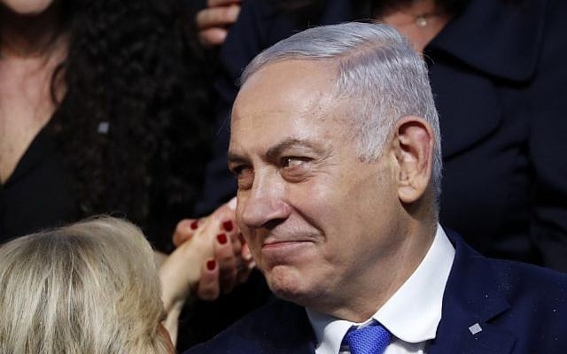 Prime Minister Benjamin Netanyahu reacts after addressing supporters at his Likud party election headquarters in the coastal city of Tel Aviv on election night early on April 10, 2019. (Thomas Coex/AFP) Prime Minister Benjamin Netanyahu reacts after addressing supporters at his Likud party election headquarters in the coastal city of Tel Aviv on election night early on April 10, 2019. (Thomas Coex/AFP)