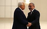 Palestinian Authority President Mahmoud Abbas (L) shakes hands with the prime minister-designate Mohammad Shtayyeh in the West Bank city of Ramallah, on April 13, 2019. (Abbas Momani/AFP)