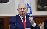 Illustrative: Prime Minister Benjamin Netanyahu speaks during the weekly cabinet meeting in Jerusalem, on April 14, 2019. (RONEN ZVULUN /AFP)