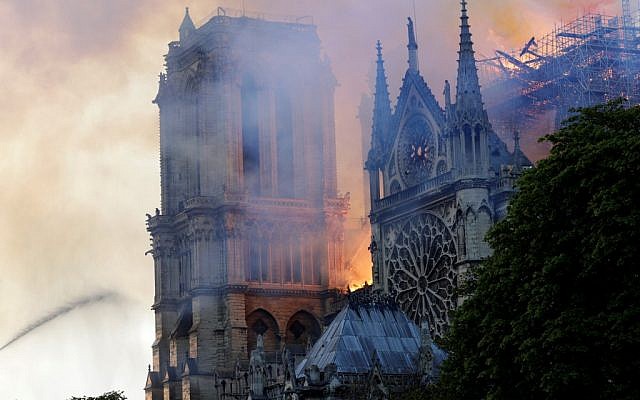 The landmark Notre-Dame Cathedral is engulfed by flames in central Paris on April 15, 2019. (Geoffroy VAN DER HASSELT / AFP) The landmark Notre-Dame Cathedral is engulfed by flames in central Paris on April 15, 2019. (Geoffroy VAN DER HASSELT / AFP)