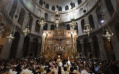 Roman Catholic Archbishop Pierbattista Pizzaballa (center), leads the Easter Sunday procession at the Church of the Holy Sepulchre in Jerusalem's Old City on April 21, 2019. (GALI TIBBON / AFP)