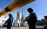 Security personnel stand guard outside St. Anthony's Shrine in Colombo on April 22, 2019, a day after the church was hit in a series of bomb blasts targeting churches and luxury hotels in Sri Lanka. (Jewel SAMAD / AFP)