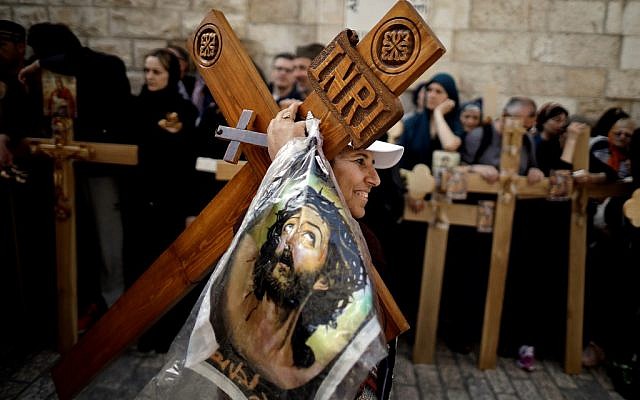 Orthodox Christians from Serbia celebrate the Good Friday in procession on Via Dolorosa in the Old City of Jerusalem, on April 26, 2019. (THOMAS COEX / AFP)