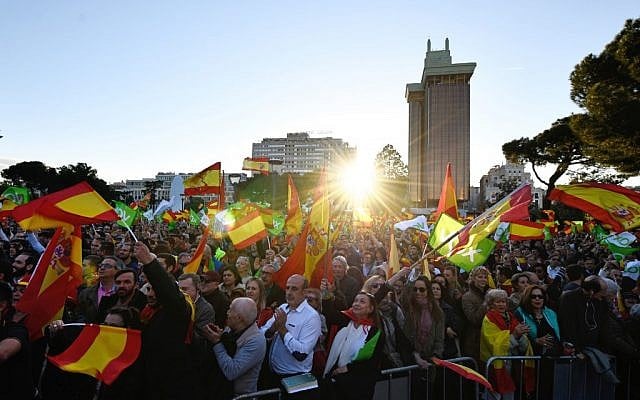 Supporters of Spanish far-right party VOX wave flags during the last campaign rally in Madrid on April 26, 2019 ahead of the April 28 general election. (OSCAR DEL POZO / AFP) Supporters of Spanish far-right party VOX wave flags during the last campaign rally in Madrid on April 26, 2019 ahead of the April 28 general election. (OSCAR DEL POZO / AFP)