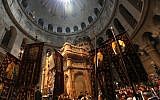 Christian Orthodox worshippers gather in the Church of the Holy Sepulchre in Jerusalems Old City as they await the Holy Fire on April 27, 2019 during the Orthodox Easter. (GALI TIBBON / AFP)