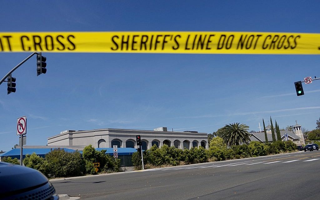 Illustrative photo: Sheriff's crime scene tape is placed in front of the Chabad of Poway Synagogue, after a shooting on April 27, 2019, in Poway, California. (Sandy Huffaker/AFP) Illustrative photo: Sheriff's crime scene tape is placed in front of the Chabad of Poway Synagogue, after a shooting on April 27, 2019, in Poway, California. (Sandy Huffaker/AFP)