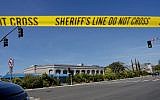 Illustrative photo: Sheriff's crime scene tape is placed in front of the Chabad of Poway Synagogue, after a shooting on April 27, 2019, in Poway, California. (Sandy Huffaker/AFP)