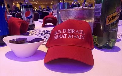 Illustrative: Tables at last year's Young Israel gala dinner were decorated by MAGA-style hats reading 'Build Israel great again.' (Ben Sales)